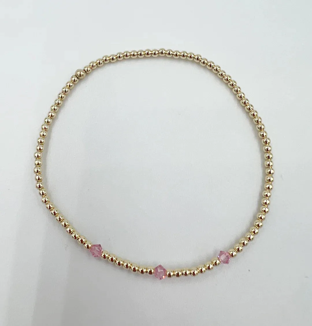 2MM 14K GOLD LEAVE ON WITH PINK CRYSTALS - SASKIA DEVRIES